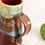 Thumbnail: Rustic red mug steins