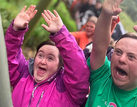 A Lotus Enrichment Centre day out - service users on a rollercoaster at Alton Towers