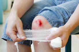 Close-up view of a bandaged wound on skin