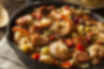 Cast iron pot of jambalaya — a classic Creole dish influenced by transplants from West Africa, France, and Spain.