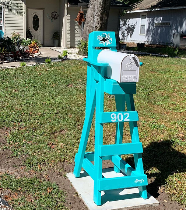 A teal lifeguard chair mailbox in Jacksonville Beach, FL