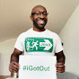 Smiling man holding """#iGotOut""" sign