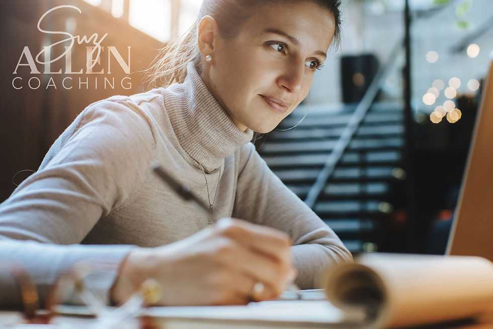Woman looking at laptop