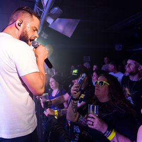 Lead singer off Dead Reynolds singing to a crowded venue