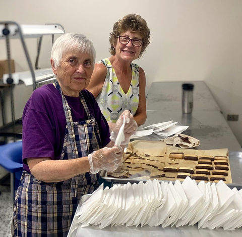 1Mary Sanders & Sue Nordman bagging cookies.jpg
