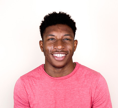 Young black man smiling at camera