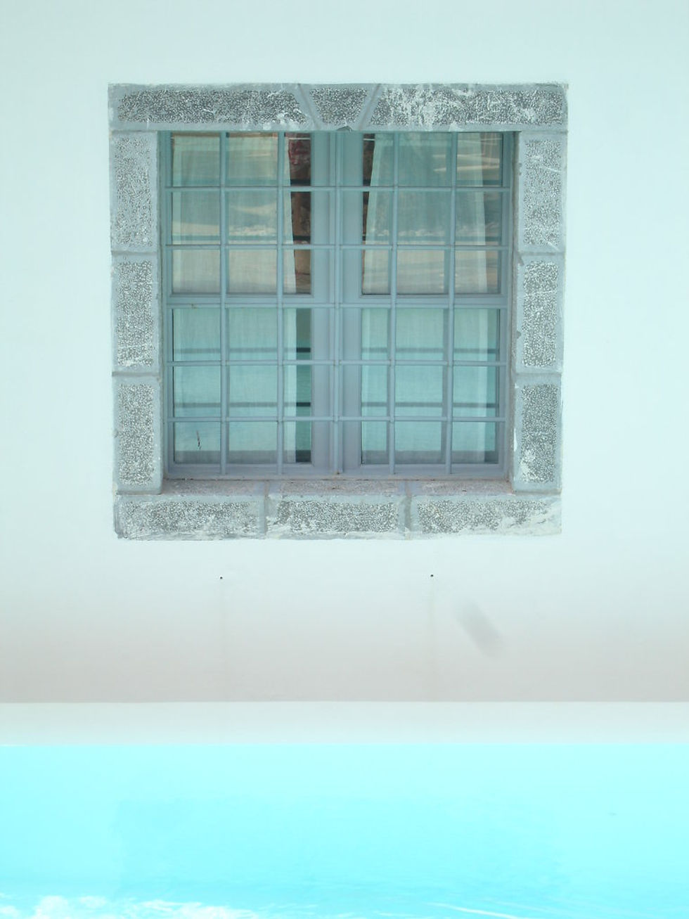 Window over swimming pool