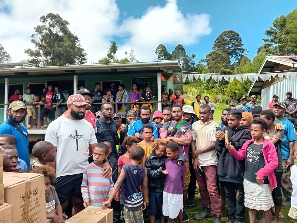 Justin Olam presenting supplies of medicine.