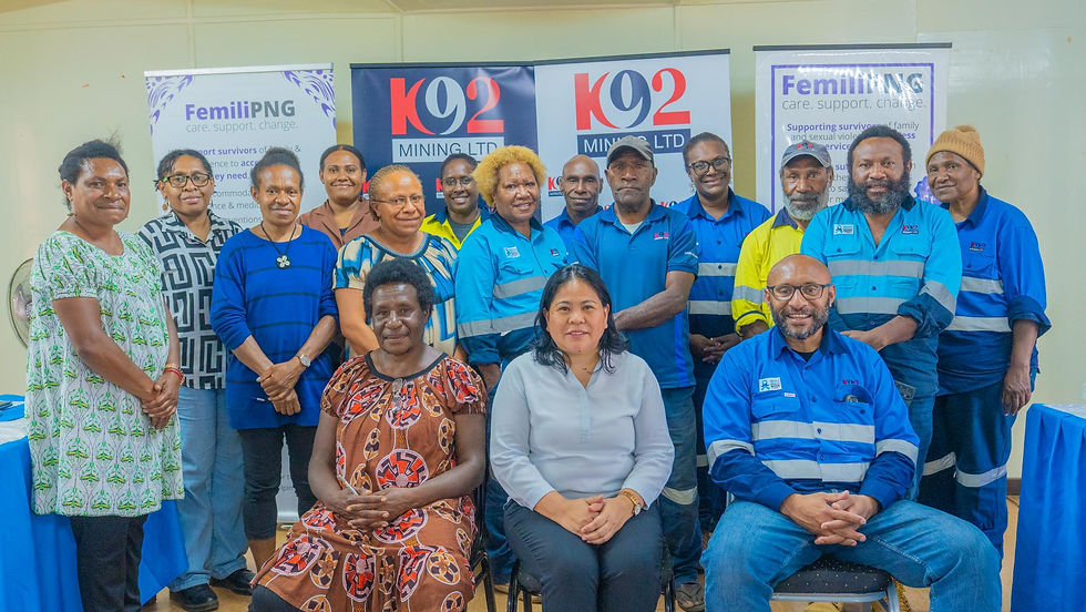 Front row (left to right): Deputy Urban Manageress Operations Jenny Biosi, Femili PNG CEO & SSW Daisy Plana, and K92 CA GM Felix Kipalan. Back row: Team reps from K92 Mining, Femili PNG, Agarabi LLG, and Kainantu Urban LLG.
