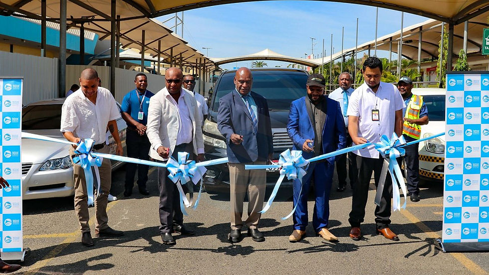 Outgoing Civil Aviation minister Wake Goi launching the taxi service with the others at the airport
