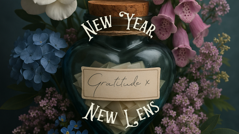 Gratitude jar surrounded with flowers and overlying text saying New Year, New Lens