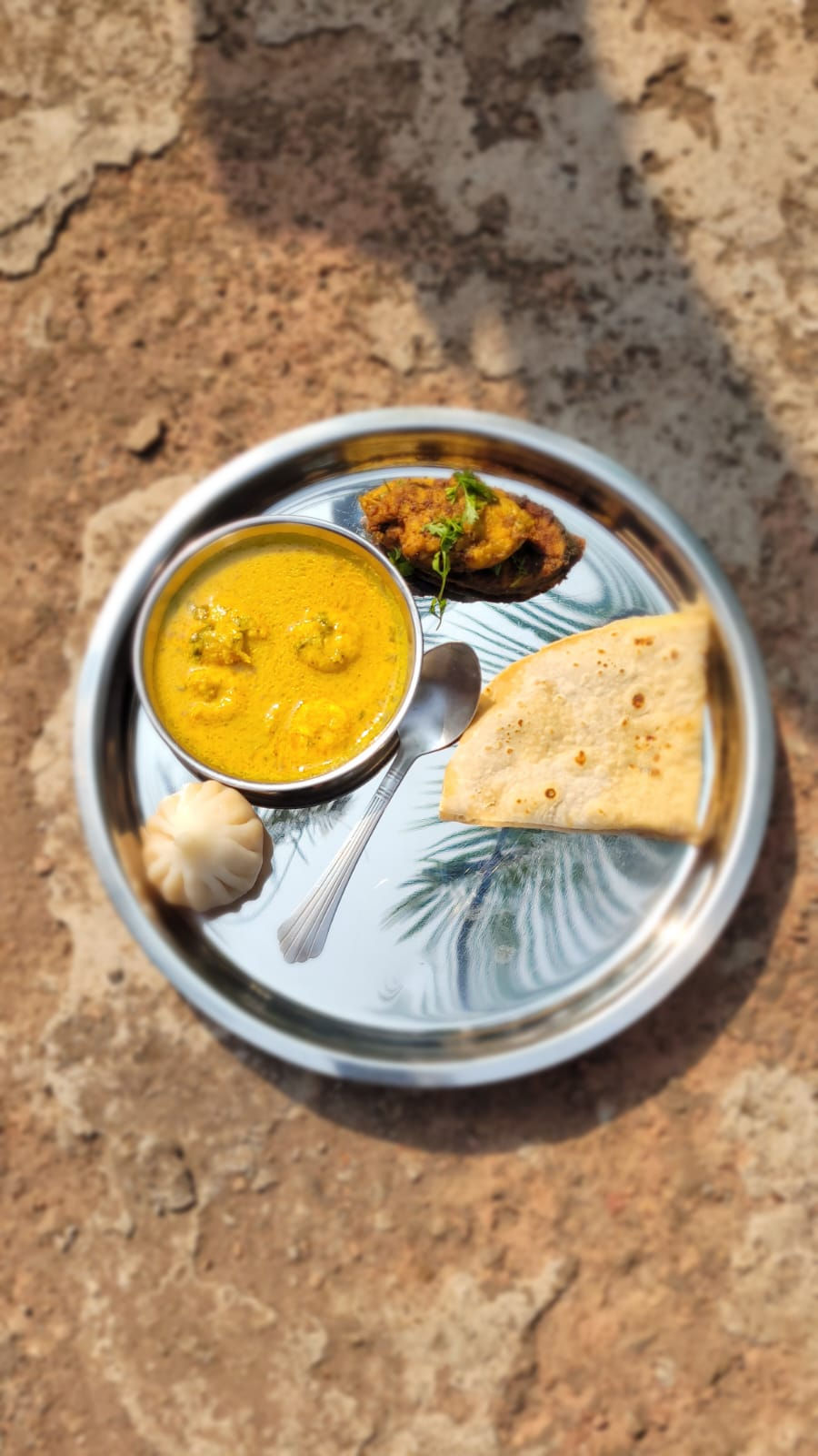 Traditional Maharashtrian Konkani thali meal prepared for guests at Shrivardhan beach resort