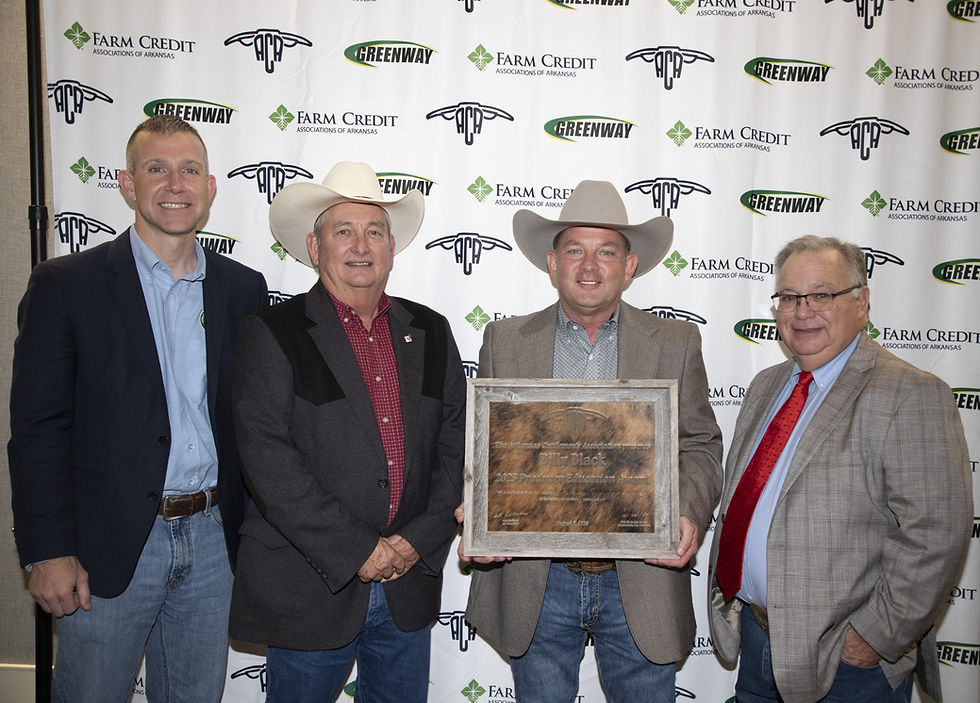 Meg Harrington holding a cowhide plaque from the ACA