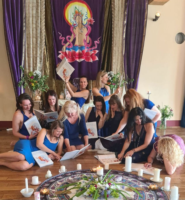 Group of women reading Demystifying Female Genitalia Book by Andrew Barnes