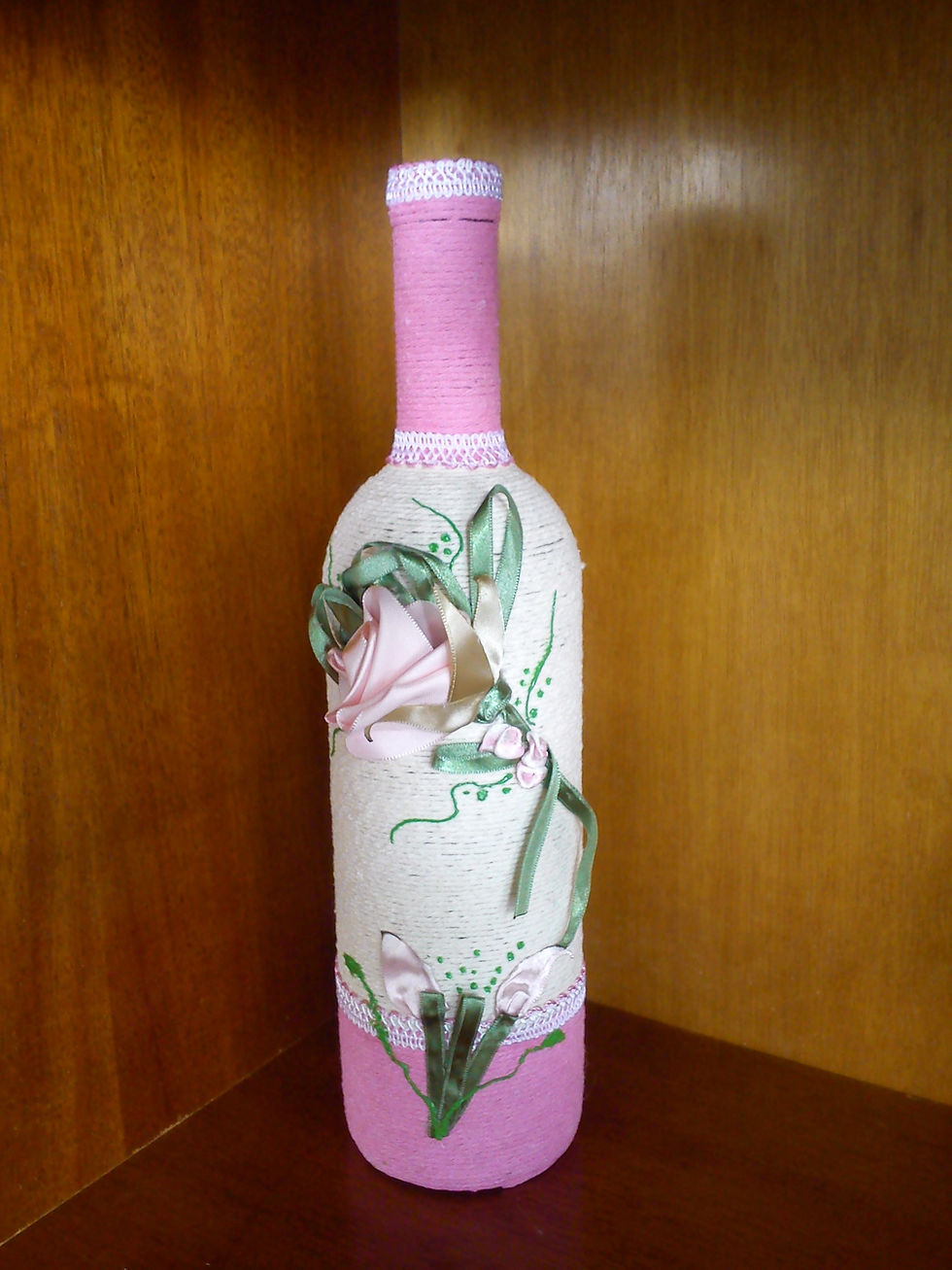 Miniatura: Garrafas em composé com barbante.