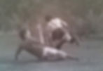 footballer tackling another player