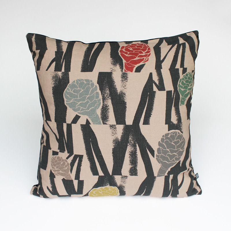 Multi coloured textile design on nude pink linen