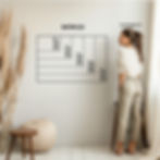 Thumbnail: a woman stands by a wall, showing scale of different print sizes