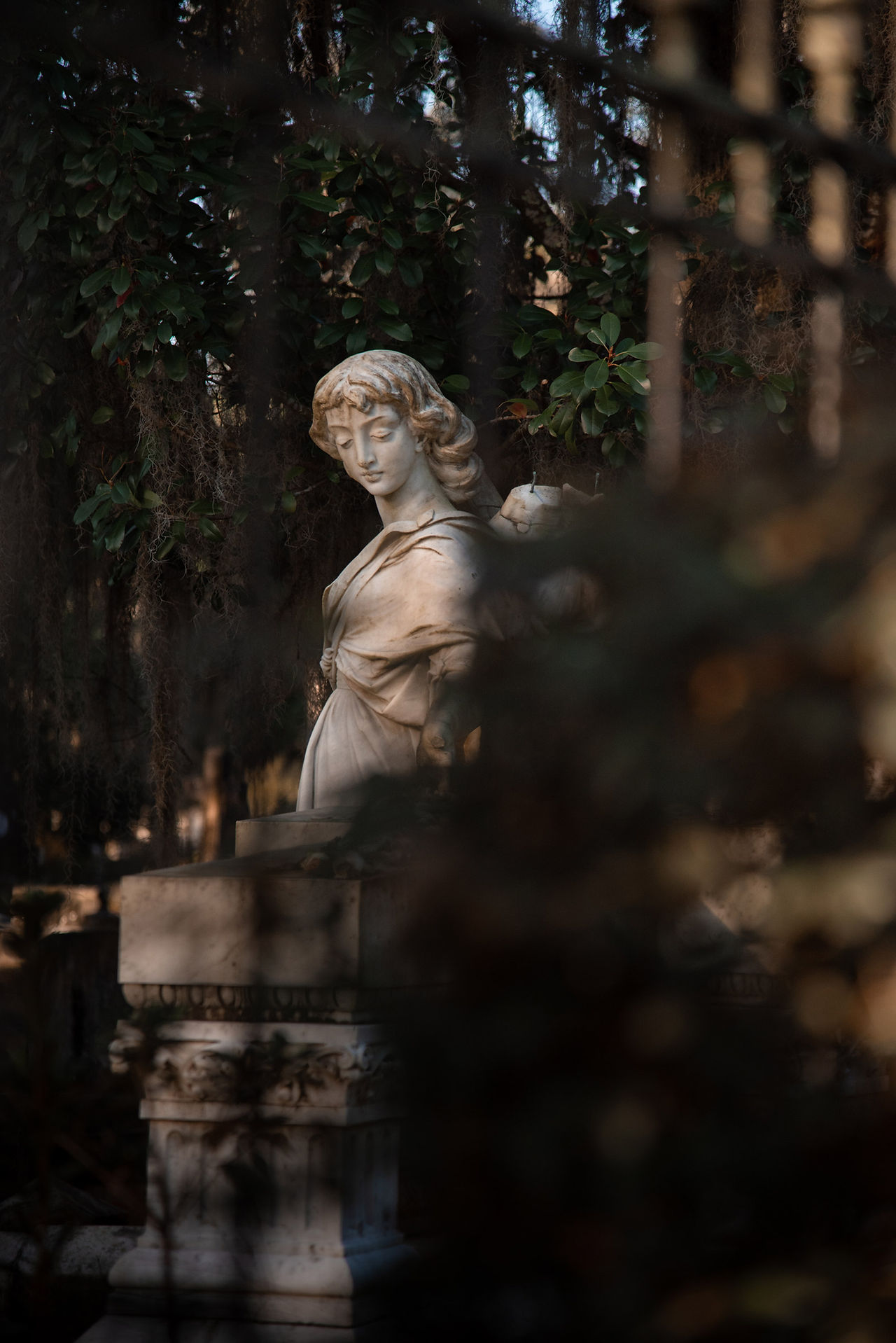 statue of woman angel
