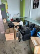 Boxes and electronic equipment are stacked & waiting For Junk Value Removal Team In SG