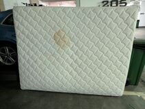 Old Mattress with a large stain removed for disposal by Junk Value SG