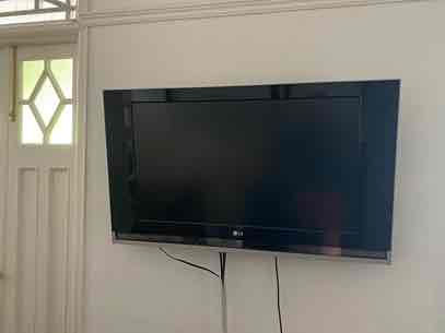 Wall Mounted TV Dismantling & Disposal By Junk Value Recycling