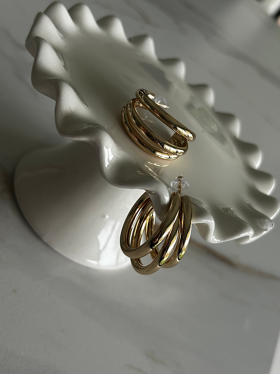 Boucles d’oreilles dorées triple anneaux