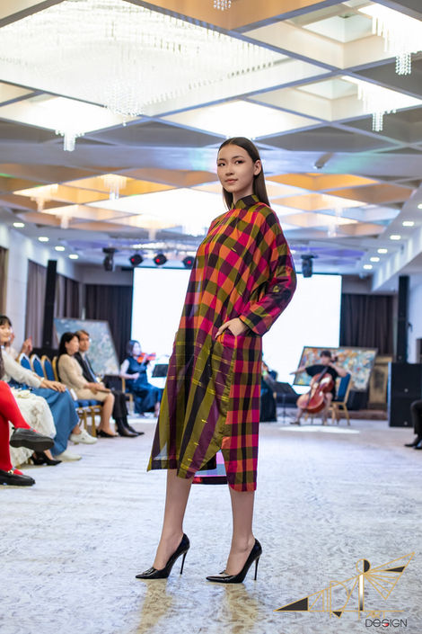 Introducing our stunning sheer silk check 'deel' dress, perfect for those warm, sunny days. Made from luxurious Indian silk material, this kaftan-style dress is lightweight and breathable, ensuring you stay cool and stylish all summer. The free-size M-L design offers a comfortable and relaxed fit, while the bold and vibrant colors are sure to turn heads wherever you go. For easy care, simply hand wash in cold water and hang to dry. Elevate your  wardrobe with this gorgeous dress, available now at Mirai Fashion Art store.