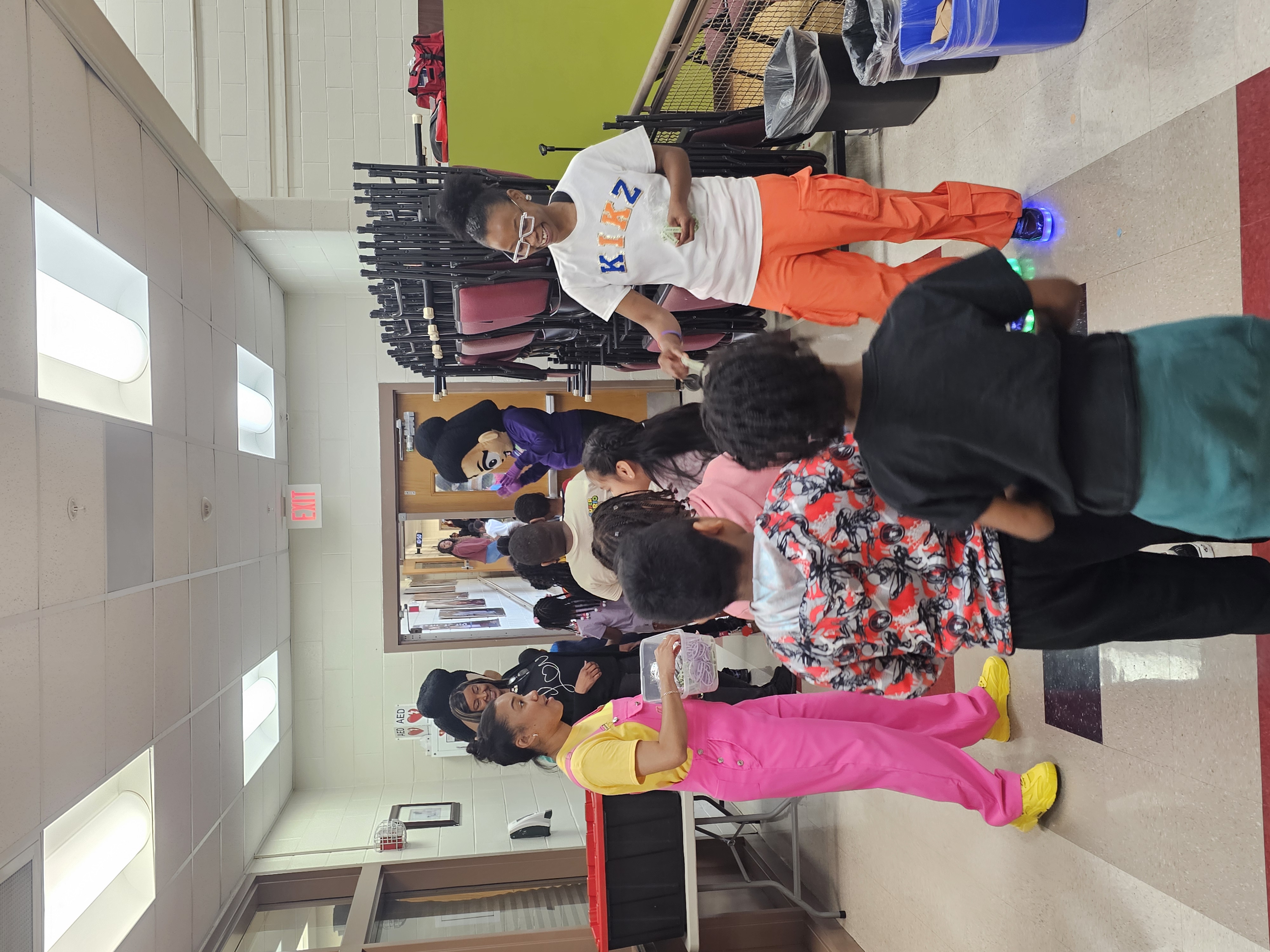 The KVK Team hands out parting gifts to students after a fantastic interaction at Kimberly Elementary
