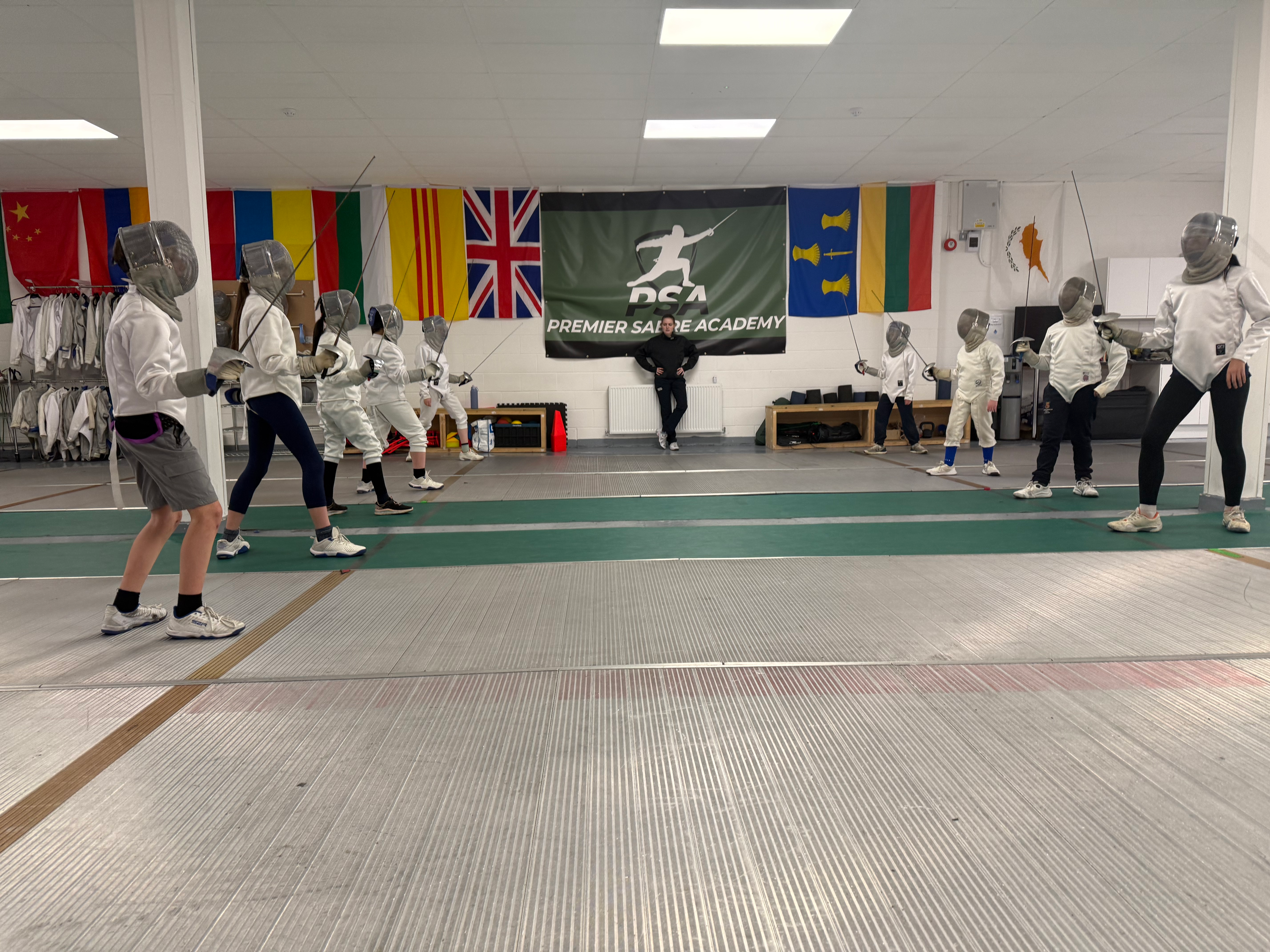 Fencing sabre silhouettes and camp highlights