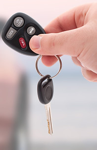 Auto locksmith handing over new keys
