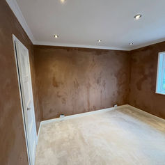 Corner of a room with smooth, freshly plastered walls