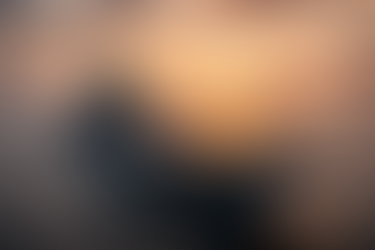 Indian Navy aircraft carrier sailing in the Arabian Sea during sunset with escort warships in formation, symbolizing maritime dominance and strategic control