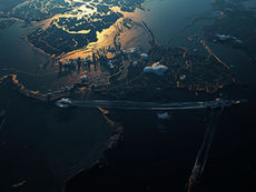 Map of the Middle East showing Iran, Israel, the Strait of Hormuz, and maritime routes linking the Arabian Sea to India