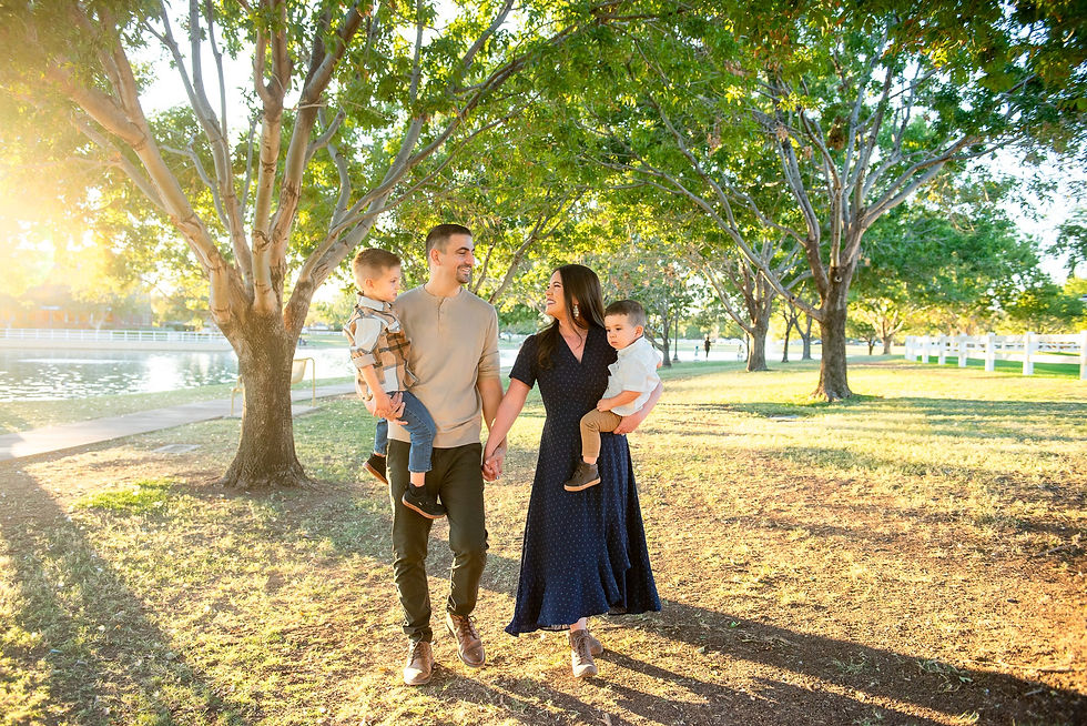 Family walking together during sunset at Morrison Ranch. A Family Photoshoot with the best Arizona family photographer in gilbert Arizona