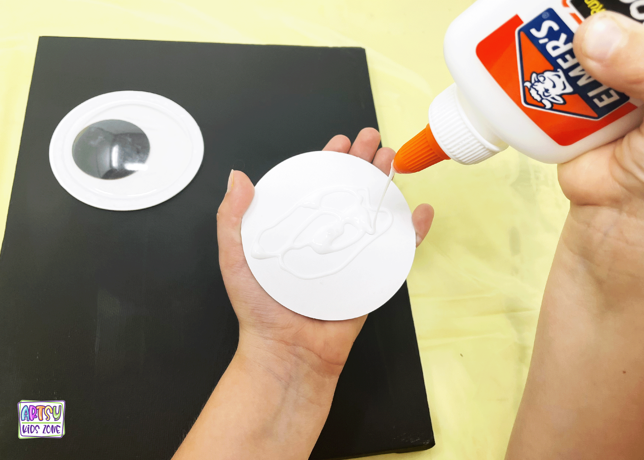 How to glue large eyes to the canvas.