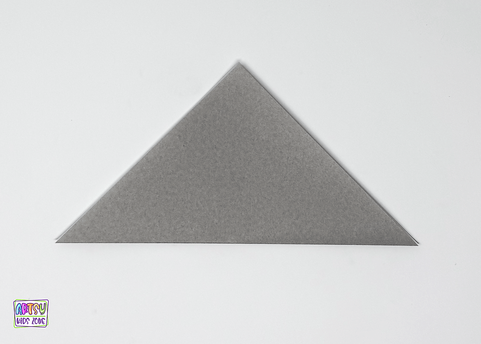 Folding it in half to make a triangle and crease firmly.