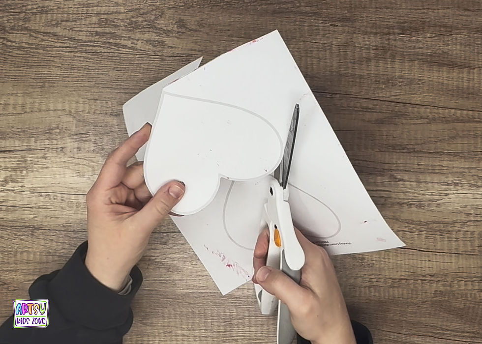 Cutting out heart shape.