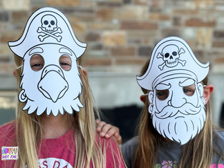 Girls wearing pirate masks.