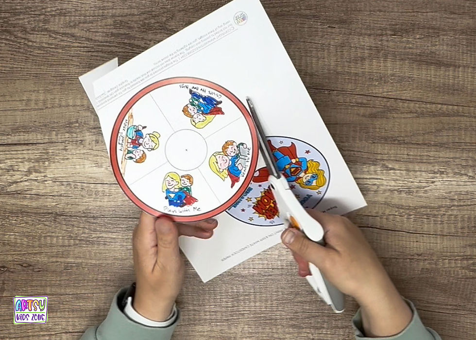 Cutting out Super Mom Spinner Craft for Kids.