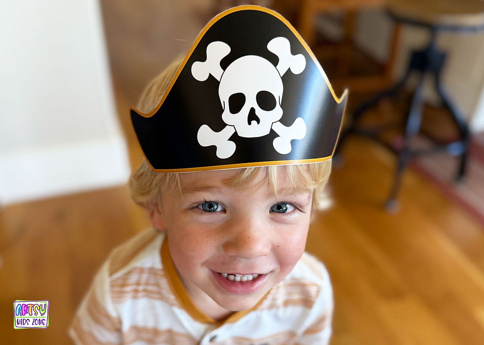 Boy wearing completed Paper Pirate Hat.