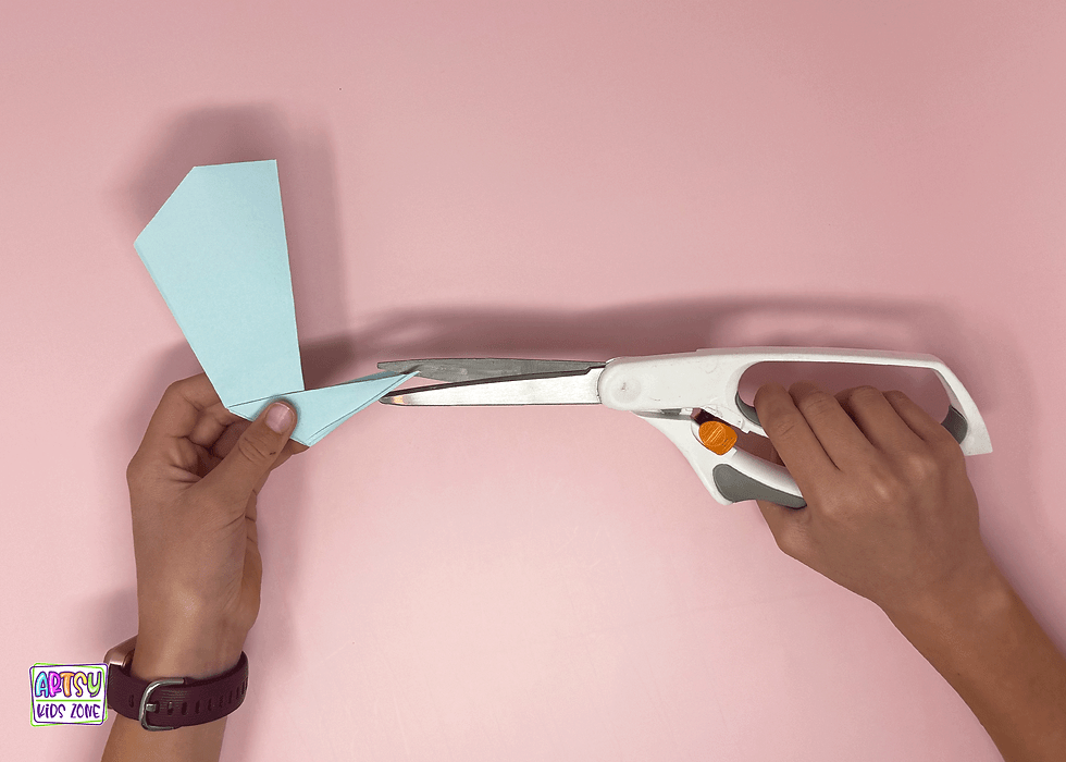 Cutting a slit on the tail.