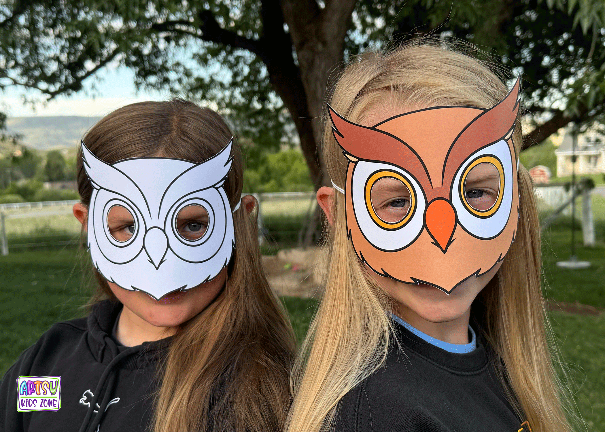 Girls wearing owl paper masks.