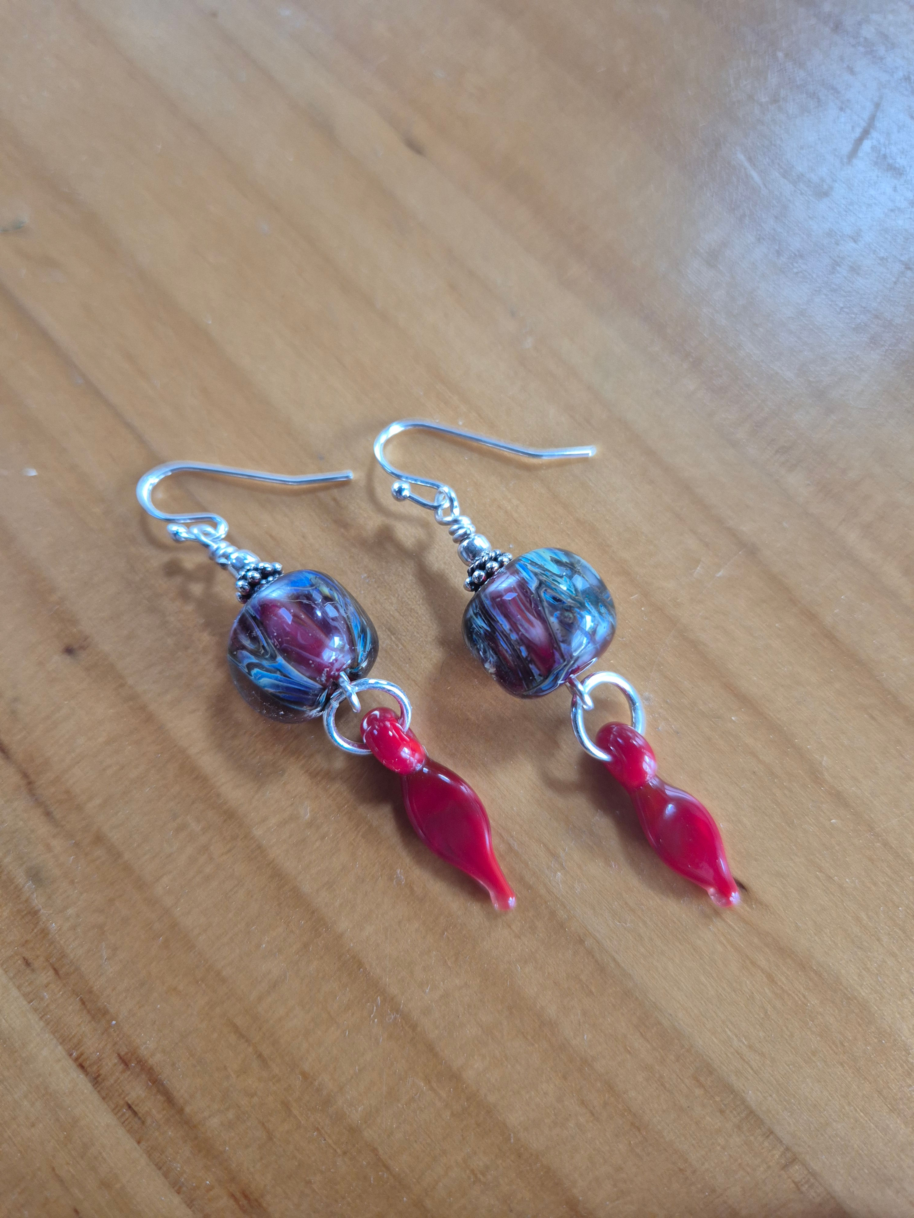 Cosmic leaf earrings