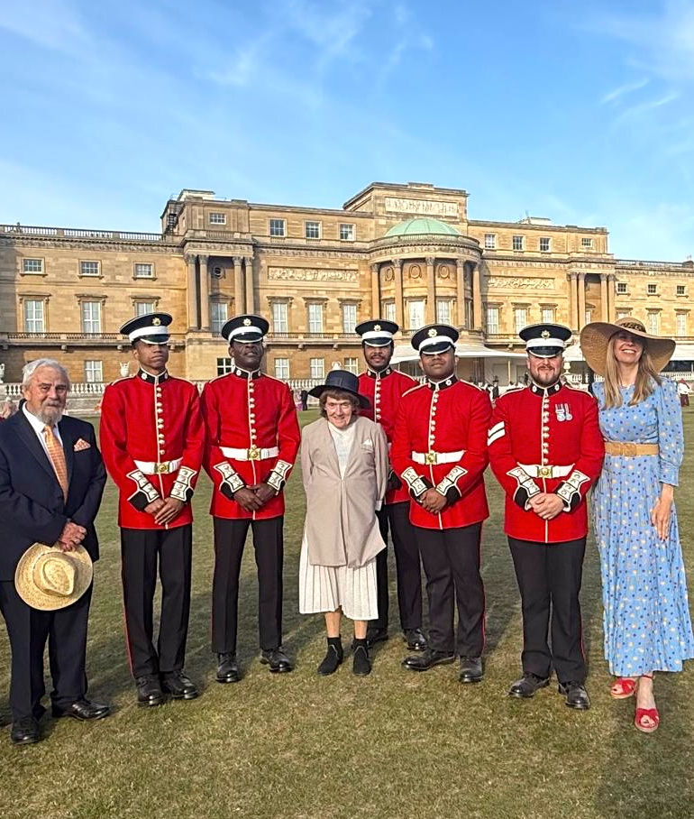 Pete, Doreen and Amanda outside Buckingham Palace