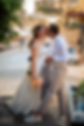 Bride and groom kissing in a street of the old souk in Byblos, natural wedding photography in Lebanon