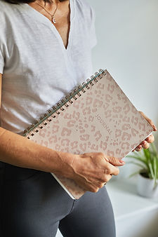 Gemma Brown holding a journal