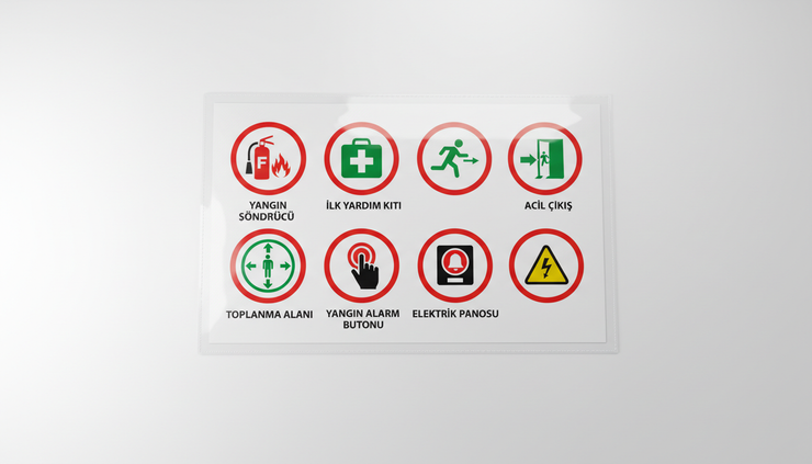 Close-up view of emergency map symbols and a legend printed on laminated paper