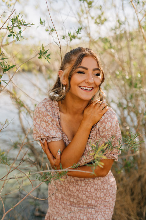 Senior girl smiling during an outdoor senior photo session