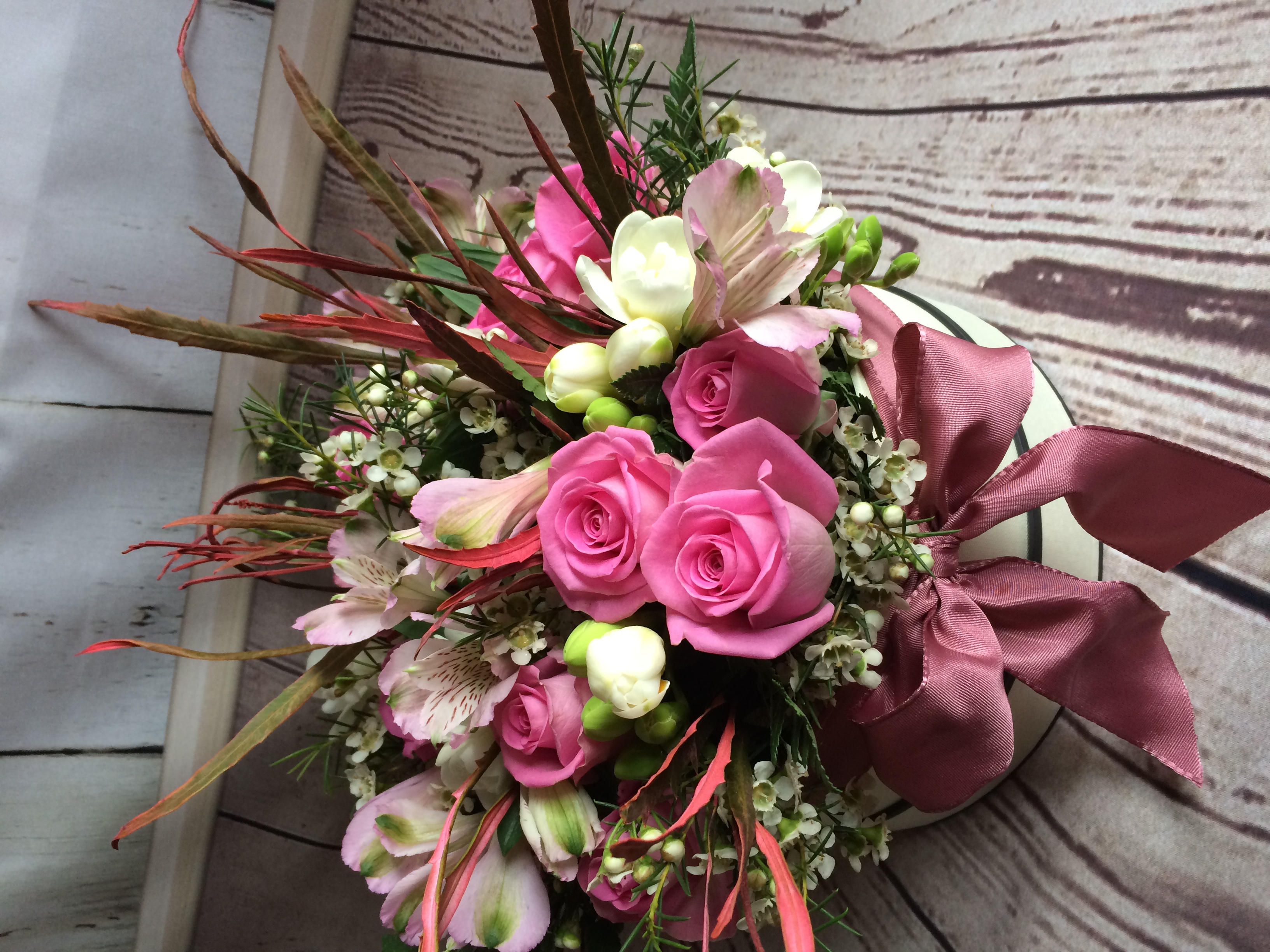 Flower filled hat box.